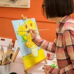 69a1787f9f148b418e514df7_illustrator-painting-in-art-studio-creative-process